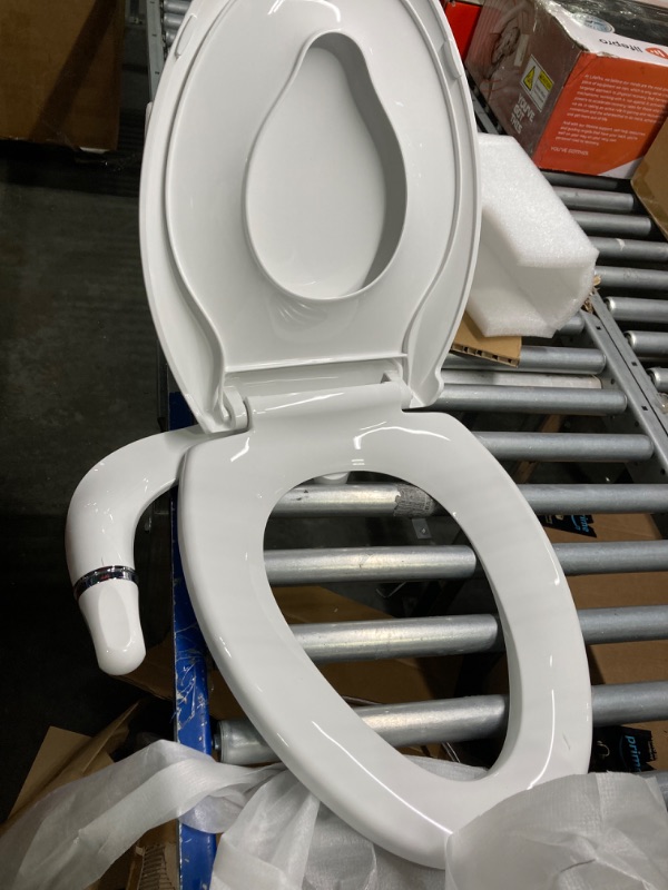 Photo 3 of Bidet Toilet Seat With Toddler Seat Built In, 3 in 1 Toilet Seat,Magnetic Kids Toilet Seat, Slow Close, Thicken Plastic Easy to Clean, Removable and Never Loosen, White(18.5”Elongated) 3 in 1 White Elongated-Bidet Kid****USED*****CAN BE USED FOR PARTS***I