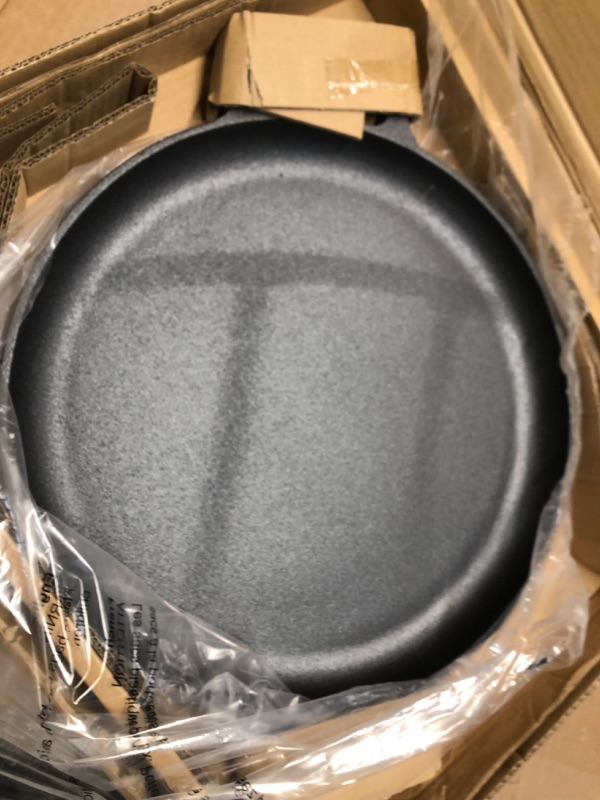 Photo 2 of ***USED***Cast Iron Pizza Pan - 14-Inch Baking Pan for Oven, Stovetop, Grill, or Campfires - Durable, Even-Heating, Versatile Cast Iron Griddle by Home-Complete 14" Pizza Pan