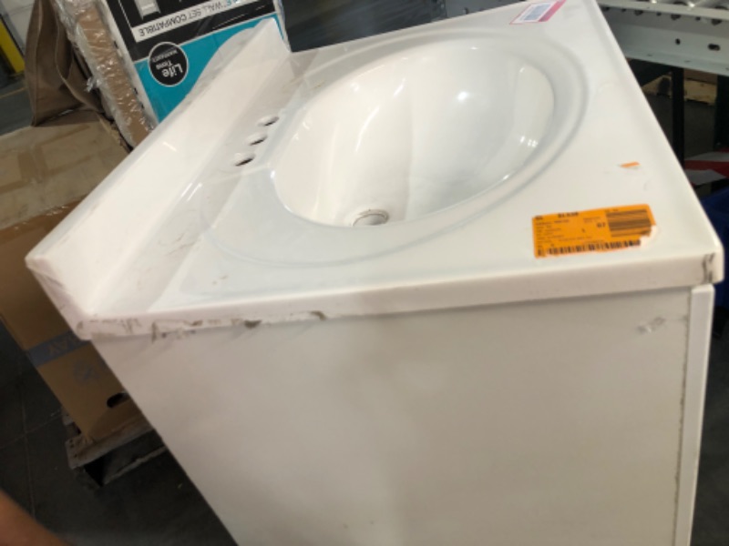 Photo 8 of ***HEAVILY USED AND DIRTY - NO PACKAGING - HANDLE BROKEN - LIKELY MISSING PARTS - SEE PICTURES***
25 in. W x 19 in. D x 35 in. H Single Sink Freestanding Bath Vanity in White with White Cultured Marble Top
