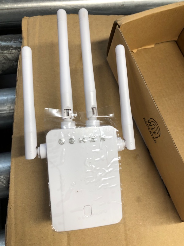 Photo 2 of *STOCK PHOTO FOR REFERENCE* WiFi Extenders Signal Booster for Home, Longest Range Up to 9,000sq.ft, Internet Amplifier with Ethernet Port, Wi-Fi Repeater