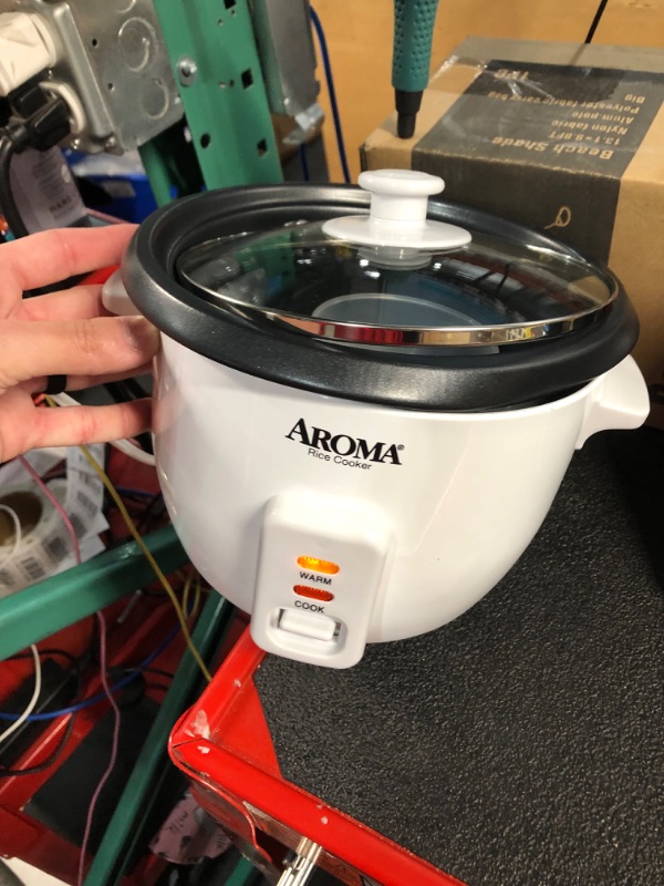 Photo 3 of **dented pot** Aroma Housewares Aroma 6-cup (cooked) 1.5 Qt. One Touch Rice Cooker, White (ARC-363NG)