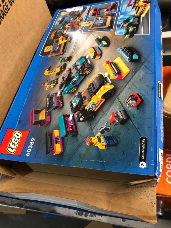 Photo 4 of LEGO City Custom Car Garage 60389, Toy Garage Building Set with 2 Cutomizable Cars, Pretend Play Mechanic Toy with 4 Mini Figures, for Boys and Girls Ages 6 and Up or Kids Who Love Cars Standard Packaging