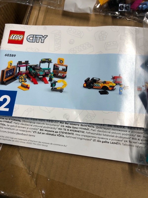 Photo 3 of LEGO City Custom Car Garage 60389, Toy Garage Building Set with 2 Cutomizable Cars, Pretend Play Mechanic Toy with 4 Mini Figures, for Boys and Girls Ages 6 and Up or Kids Who Love Cars Standard Packaging