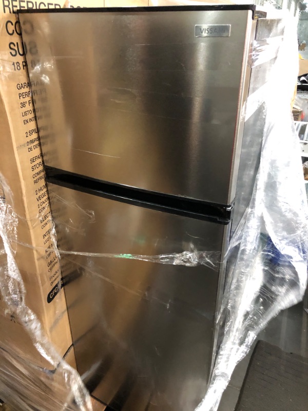 Photo 2 of **MINOR DAMAGE** Vissani 7.1 cu. ft. Top Freezer Refrigerator in Stainless Steel Look *Scratches to exterior, inside is clean*
