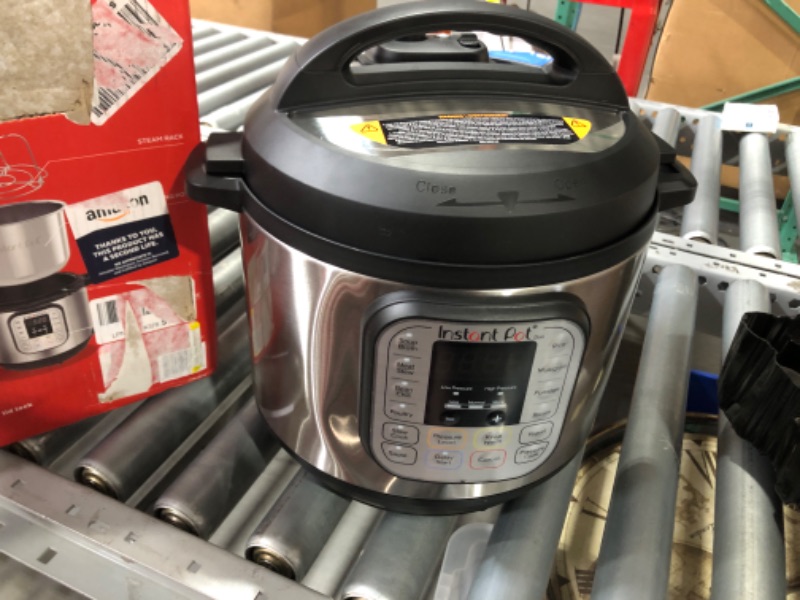 Photo 3 of (MINOR DAMAGE/ SEE NOTES) Instant Pot Duo 7-in-1 Electric Pressure Cooker, Slow Cooker, Rice Cooker, Steamer, Sauté, Yogurt Maker, Warmer & Sterilizer, Includes App With Over 800 Recipes, Stainless Steel, 6 Quart 6QT Duo Pressure Cooker