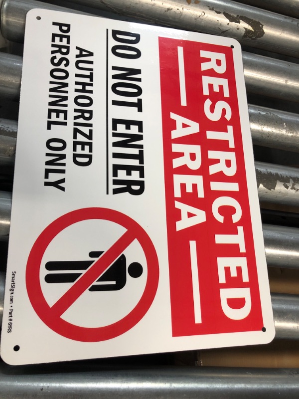 Photo 2 of SmartSign 10 x 14 inch “Restricted Area - Do Not Enter, Authorized Personnel Only” OSHA Metal Sign, 40 mil Laminated Rustproof Aluminum, Red, Black and White