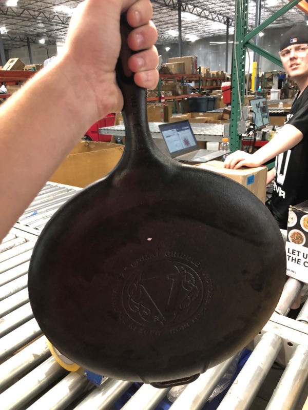 Photo 4 of **DIRTY** Victoria 12-Inch Cast-Iron Comal Pizza Pan with a Long Handle and a Loop Handle, Preseasoned with Flaxseed Oil, Made in Colombia 12 Inch