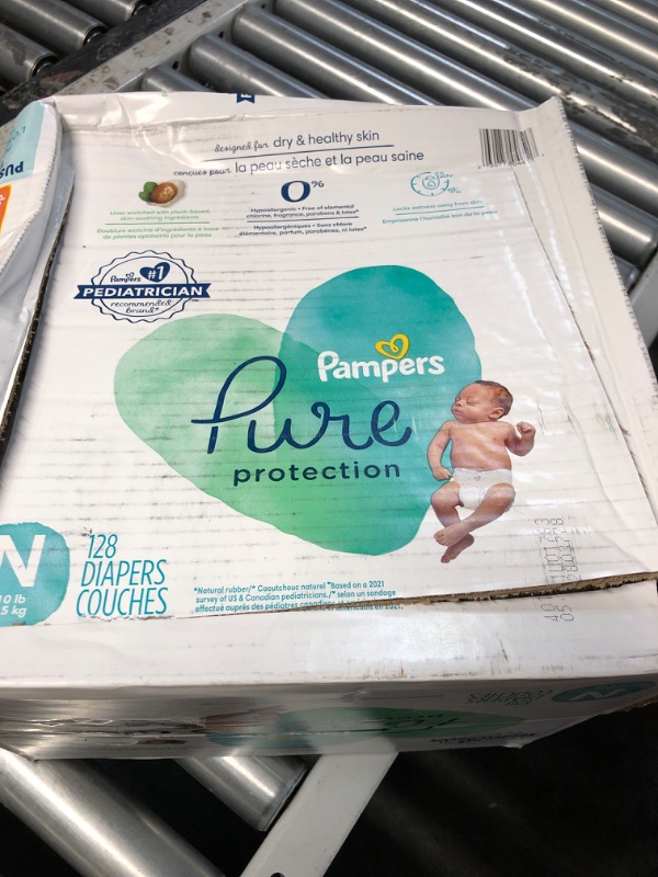 Photo 3 of Diapers Size 0, 128 Count - Pampers Pure Protection Disposable Baby Diapers, Hypoallergenic and Unscented Protection, Enormous Pack (Packaging & Prints May Vary) Size 0 (128 Count) ONE Month Supply