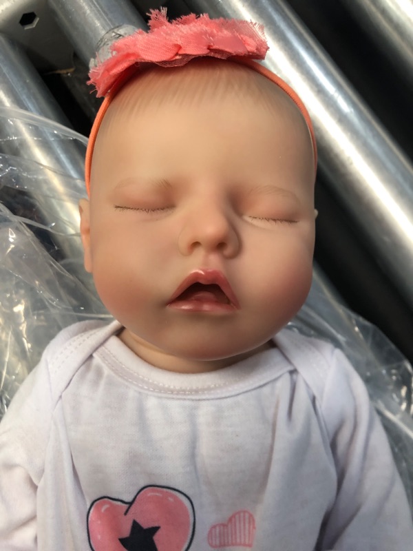 Photo 4 of DAYOFF KIDS Reborn Baby Dolls,18 Inch Lifelike Realistic Newborn Doll with Soft Vinyl Body That Look Real,Christmas/Birthday Baby Doll Gift for Kids Age 3