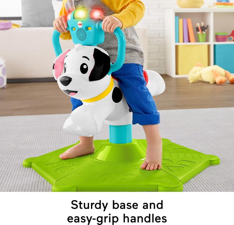 Photo 1 of Fisher-Price Toddler Learning Toy, Bounce and Spin Puppy Stationary Ride-On Bouncer with Music & Lights for Infants Ages 1+ Years