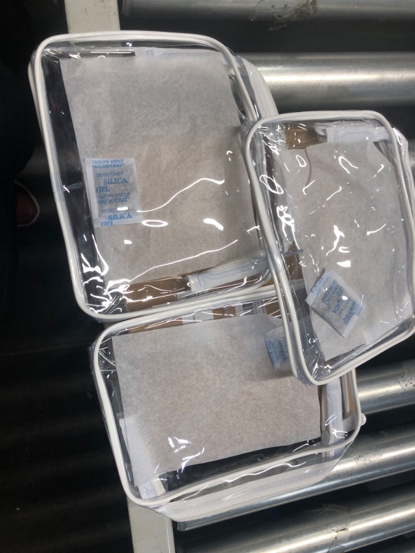 Photo 1 of 3 pack 
Clear small hand bags 