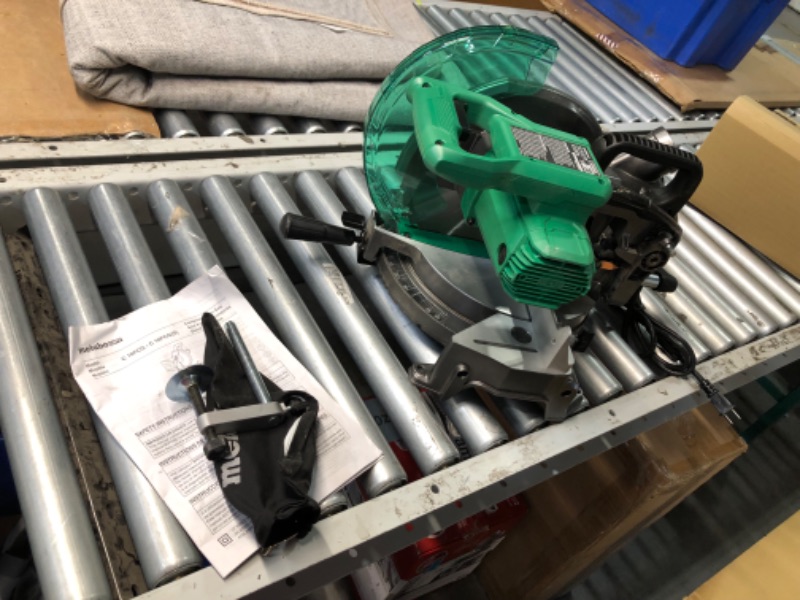 Photo 7 of ***USED - LIKELY MISSING PARTS - UNABLE TO VERIFY FUNCITONALITY***
Metabo HPT Compound Miter Saw, 10" Miter Saw with Large Table Saw for woodworking, Power saw with 15-Amp Motor, Accurate Miter Angles, 0-45° Bevel, 24T TCT Miter Saw Blade, Positive Stops,