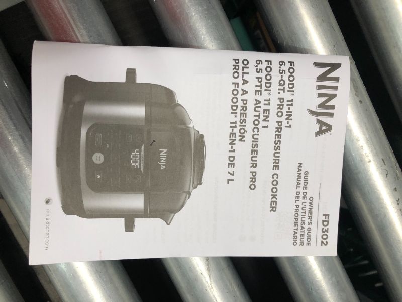 Photo 7 of ***DAMAGED - SEE COMMENTS***
Ninja FD302 Foodi 11-in-1 Pro 6.5 qt. Pressure Cooker & Air Fryer that Steams, Slow Cooks, Sears, Sautés, Dehydrates & More, with 4.6 qt. Crisper Plate, Nesting Broil Rack & Recipe Book, Silver/Black 6.5 Quart Cooking Pot