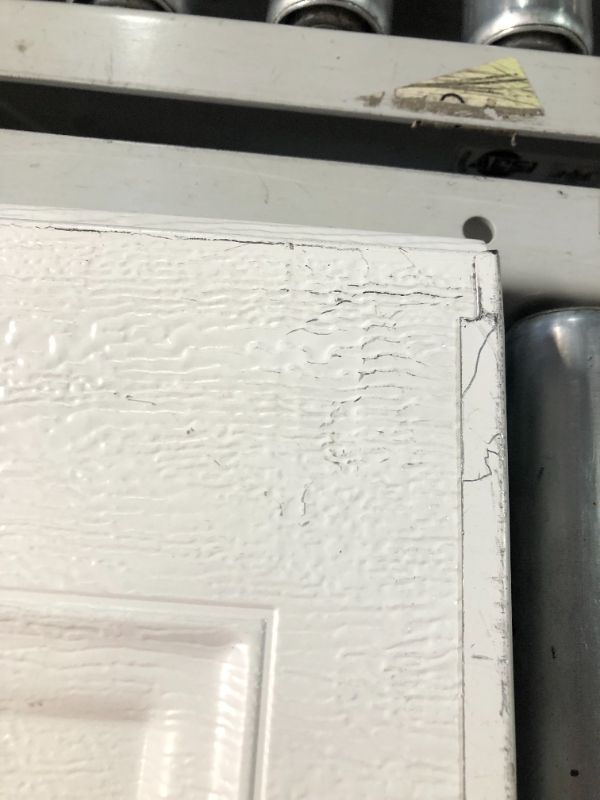 Photo 7 of ***DAMAGED - SCRATCHED AND SCRAPED - ONLY A SINGLE PANEL INCLUDED - SEE PICTURES***
Clopay Classic Steel Short Panel 8 ft x 7 ft Non-Insulated White Garage Door without Windows