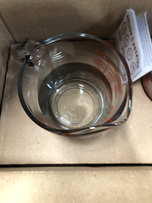 Photo 3 of **MINOR DAMAGE CHIPPED ON RIM**
Anchor Hocking Glass Measuring Cups, 4 Piece Set - 5 oz, 1-cup, 2-cup, 4-cup Set of 4 Clear