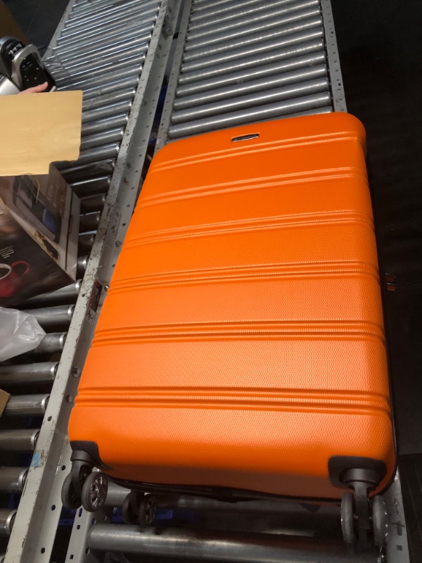 Photo 2 of **READ NOTES**
Rockland Hardside Expandable Carry On Luggage with Spinner Wheels, Orange
