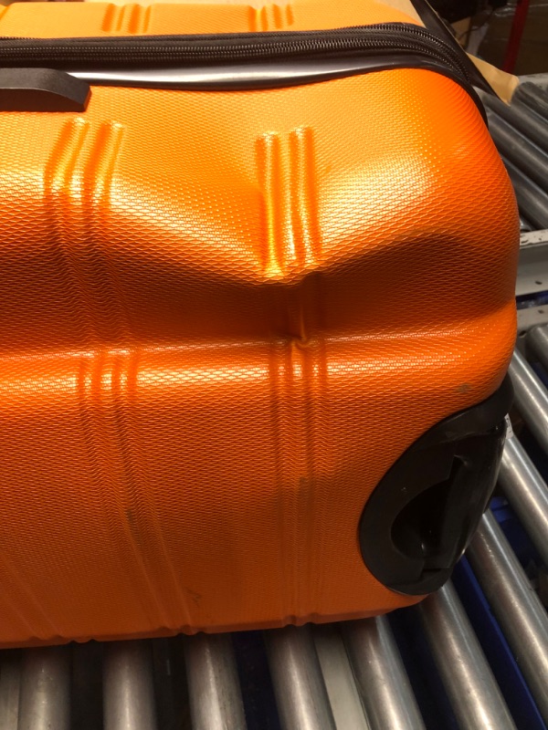 Photo 3 of **READ NOTES**
Rockland Hardside Expandable Carry On Luggage with Spinner Wheels, Orange
