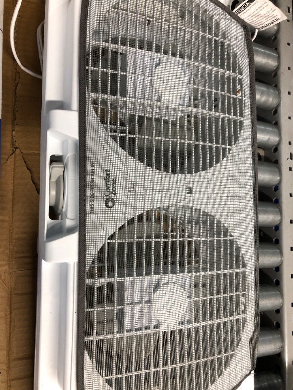 Photo 2 of Comfort Zone CZ319WT2 9" Twin Window Fan with Reversible Airflow Control, Auto-Locking Expanders and 3-Speed Fan Switch with Quiet Setting, White 9" Twin Window Fan w/ Quiet Speed