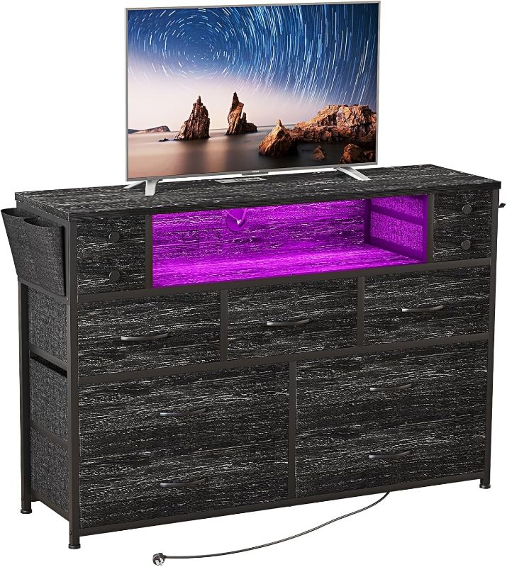 Photo 1 of Dresser TV Stand with Power Outlets and LED Lights for 55'' TV, 11 Drawers Dresser with Side Pocket, Fabric Chest of Drawers with PU Finish, Sturdy Frame & Wood Top (Charcoal Black)