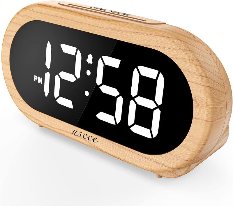 Photo 1 of uscce Small Digital Alarm Clock with USB Port for Charging, 0-100% Dimmer, Easy to Set, Alarm Volume with 5 Alarm Sounds, 12/24Hr, Snooze, Battery Backup, Compact Alarm Clock for Bedroom(Wood Grain)