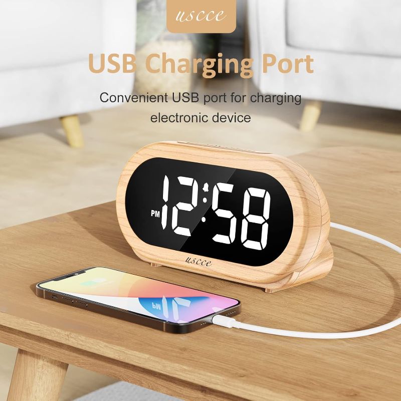 Photo 2 of uscce Small Digital Alarm Clock with USB Port for Charging, 0-100% Dimmer, Easy to Set, Alarm Volume with 5 Alarm Sounds, 12/24Hr, Snooze, Battery Backup, Compact Alarm Clock for Bedroom(Wood Grain)