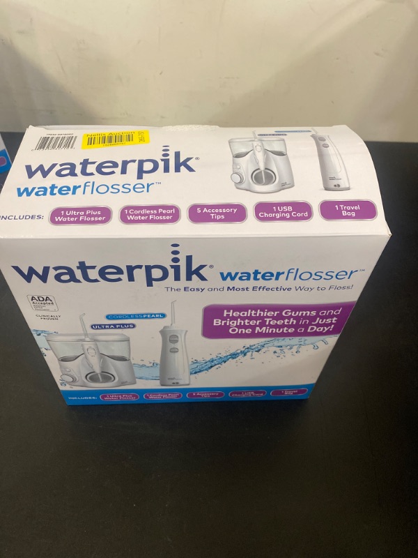 Photo 1 of Waterpik Waterflosser Ultra Plus Water Flosser & Cordless Pearl Water Flosser - 5 Accessory tips, USB Charging Cable & Travel Case, 1 Pack