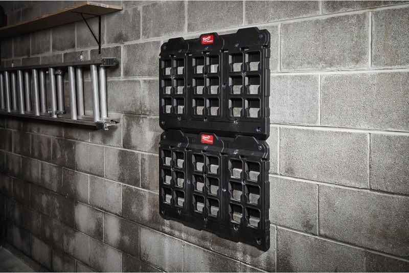 Photo 2 of Milwaukee Packout Mounting Plate - Quick alignment tabs; Metal reinforced mounting points; 150 lbs. wall mounted capacity; Impact resistant polymer body; Mounting positions spaced for 16 in. on-center stud installation; Wall and floor mounting; Fully cust