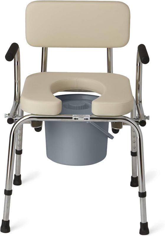 Photo 1 of Medline Drop Arm Commode with Padded Seat and Backrest, Durable Toilet Chair for Adults and Seniors, Removable Pail, Splash Guard, Drop Down Arms for Easy Transfer, 350 lb. Weight Capacity, Tan