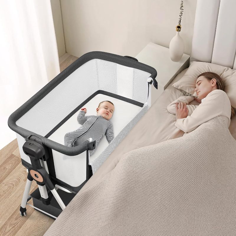 Photo 1 of Baby Bassinet Bedside Sleeper, 3 in 1 Rocking Bassinet for Baby, Bassinet Bedside Sleeper with Wheels, Adjustable Height, Storage Basket, Mattress & Canopy, Bed Side Bassinet for Newborn (Dark Grey)