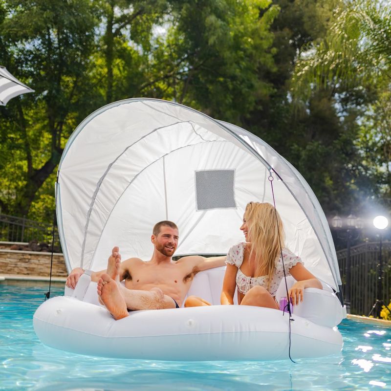 Photo 1 of Comfy Floats Inflatable Cabana - 2 Person Pool Float with Detachable Fabric Sun Shade, Backrest, Built in Cup Holders, and Grab Rope light blue