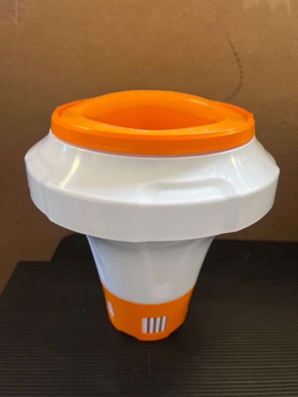 Photo 1 of Flowclear Floating Pool Chemical Dispenser with ChemGuard Glove