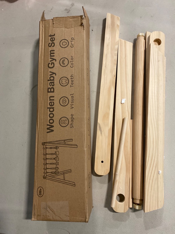 Photo 4 of HAN-MM Wooden Baby Gym Wooden Baby Toys not included Foldable Baby Play Gym Frame Activity Gym Hanging Bar Newborn Gift Baby Girl and Boy Gym (Natural Color)