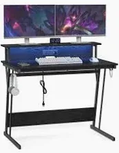 Photo 1 of VASAGLE LED Gaming Desk with Power Outlets, Computer Desk with USB Ports, Office Desk with Monitor Stand for 2 Monitors, with Hooks, for Bedroom, 23.6 x 39.4 x 29.5 Inches, Ebony Black ULWD091B56