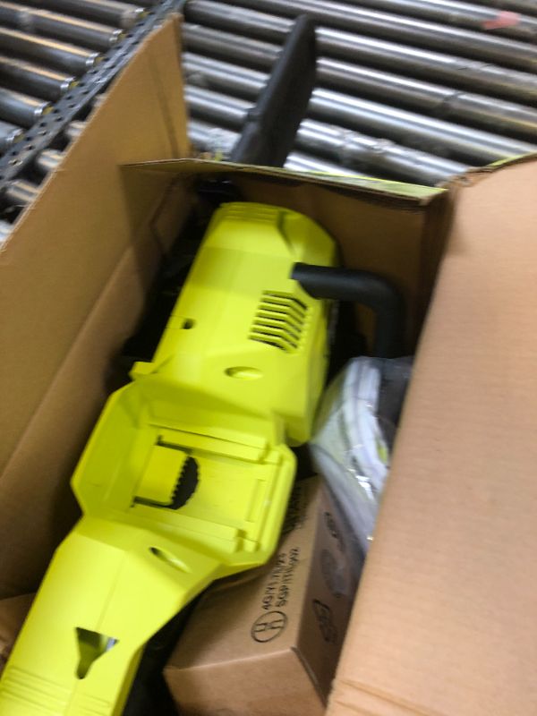 Photo 1 of 40V HP Brushless 14 in. Cordless Battery Chainsaw with 4.0 Ah Battery and Charger