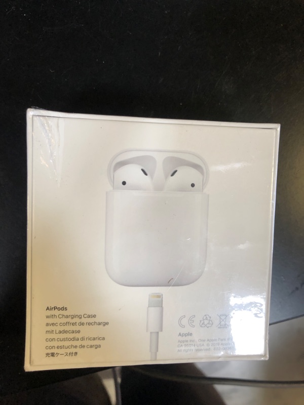 Photo 4 of Apple AirPods with Charging Case (Latest Model) factory sealed 