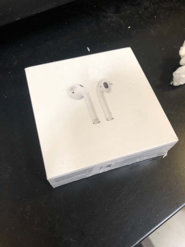 Photo 2 of Apple AirPods with Charging Case (Latest Model) factory sealed 