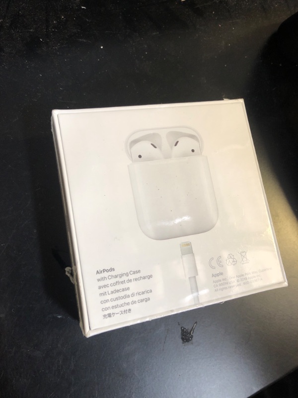 Photo 4 of Apple AirPods with Charging Case (Latest Model) factory sealed