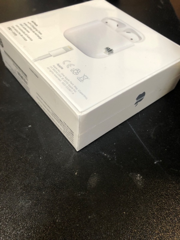 Photo 4 of Apple AirPods with Charging Case (Latest Model) factory sealed