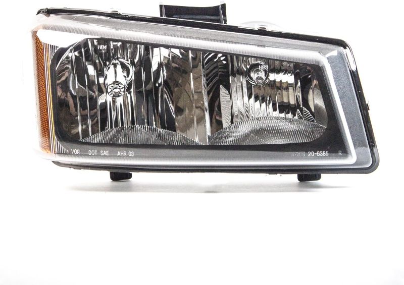 Photo 1 of TYC Right Headlight Assembly Compatible with 2003-2006 Chevrolet Silverado
