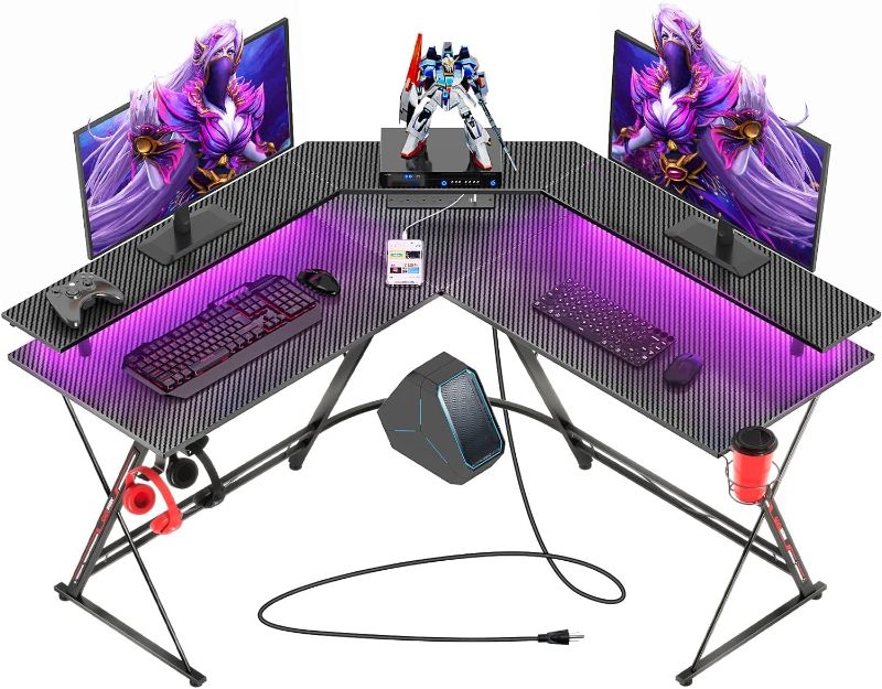 Photo 1 of SEVEN WARRIOR L Shaped Gaming Desk with LED Lights & Power Outlets, 50.4” Computer Desk with Monitor Stand & Carbon Fiber Surface, Corner Desk with Cup Holder, Gaming Table with Hooks, Black
