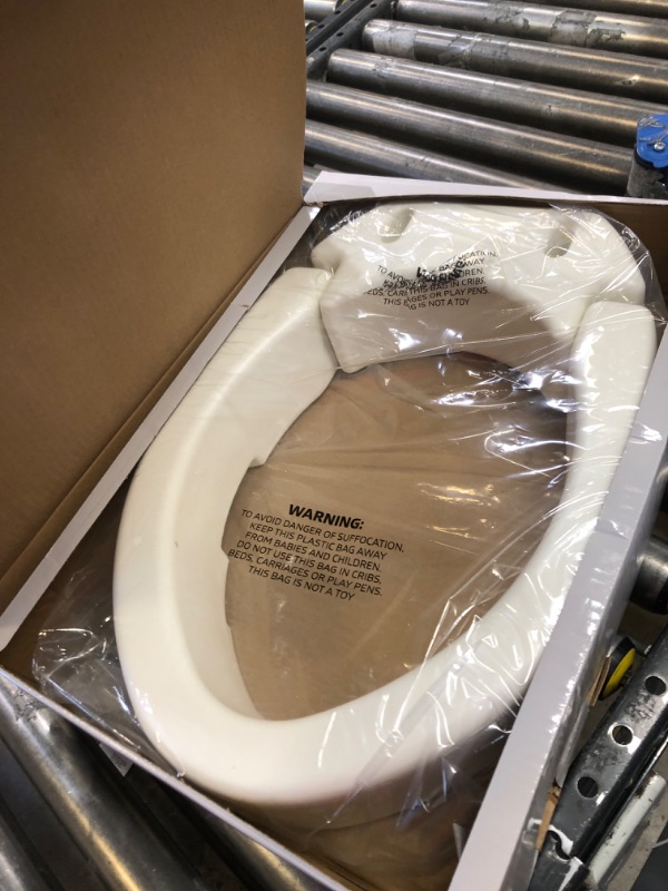 Photo 1 of Medline Toilet Seat Riser, Hinged, Elongated, White