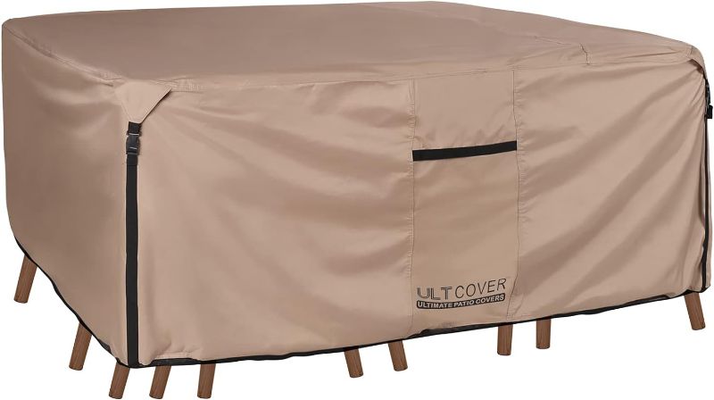 Photo 1 of ULTCOVER Rectangular Patio Heavy Duty Table Cover - 600D Tough Canvas Waterproof Outdoor Dining Table and Chairs General Purpose Furniture Cover Size 111L x 74W x 28H inch
