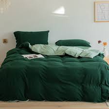 Photo 1 of green bed comforter