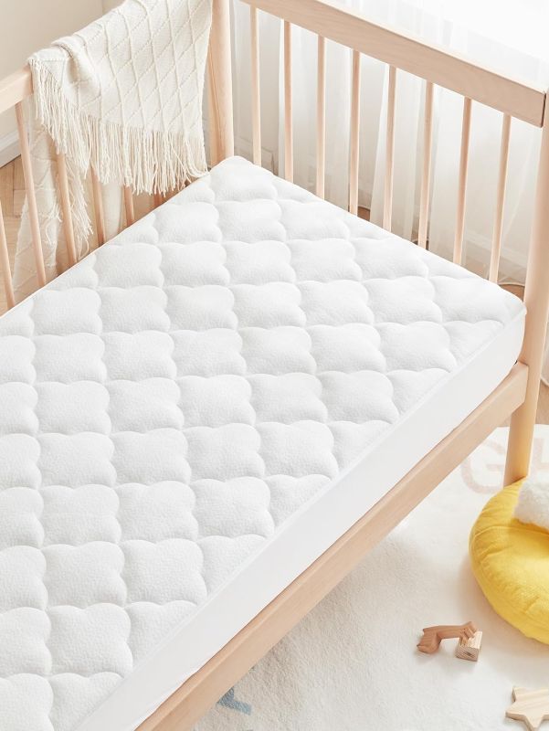 Photo 1 of Crib Mattress Protector Pad