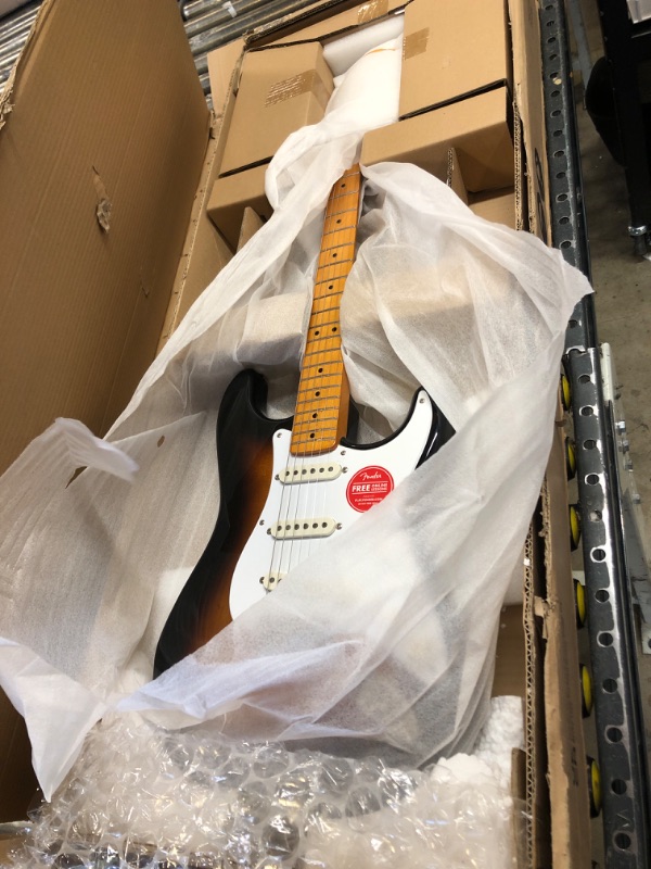 Photo 2 of Fender Squier Debut Series Stratocaster Electric Guitar, Beginner Guitar, with 2-Year Warranty, Includes Free Lessons, 2-Color Sunburst with Matte Finish
