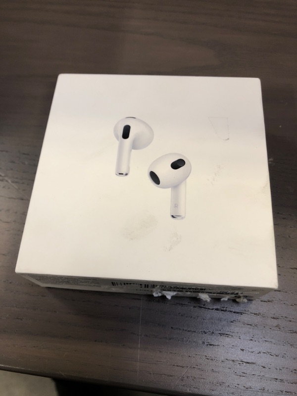 Photo 2 of Apple AirPods (3rd Generation) Wireless Ear Buds, Bluetooth Headphones, Personalized Spatial Audio, Sweat and Water Resistant, Lightning Charging Case Included, Up to 30 Hours of Battery Life
