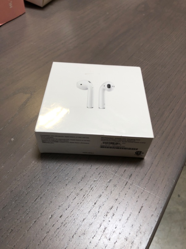 Photo 1 of Apple AirPods (2nd Generation) Wireless Ear Buds, Bluetooth Headphones with Lightning Charging Case Included, Over 24 Hours of Battery Life, Effortless Setup for iPhone
