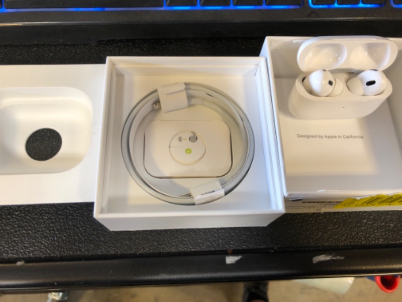 Photo 4 of Apple AirPods (2nd Generation) Wireless Ear Buds, Bluetooth Headphones with Lightning Charging Case Included, Over 24 Hours of Battery Life, Effortless Setup for iPhone
