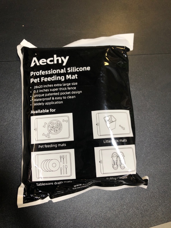 Photo 2 of AECHY Dog Mat for Food and Water, Silicone Dog Food Mat with Pocket for Catches Spill and Residue, Multiple Sizes, Colors Dog Feeding Mat, Non Slip Cat Dog Water Bowl Mat with High Edges Cat Food Mat 28"x20" Gray