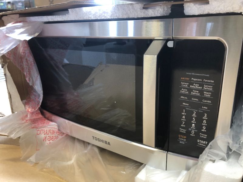 Photo 2 of TOSHIBA 4-in-1 ML-EC42P(SS) Countertop Microwave Oven, Smart Sensor, Convection, Air Fryer Combo, Mute Function, Position Memory Turntable with 13.6" Turntable, 1.5 Cu Ft, 1000W, Silver Air Fry-1.5 Cu.Ft.-Silver